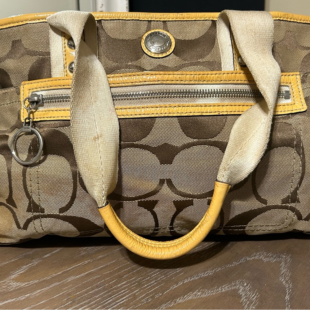 Tan and yellow coach